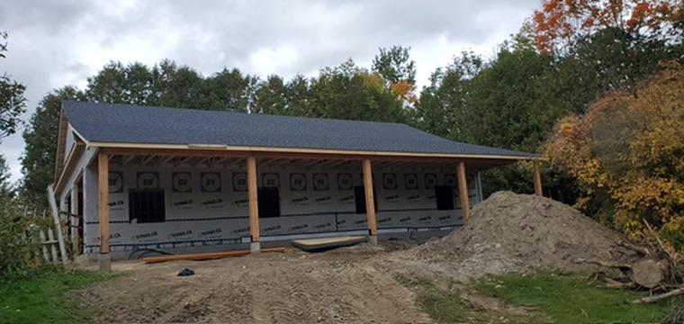 Completed dark shingle roof on new construction garage by 905 Roofing Inc. in Durham Region and the GTA