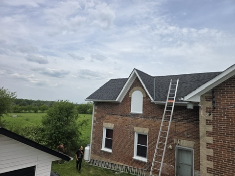 Roof tear-off with old decking exposed on rural property by 905 Roofing Inc. in Durham Region and the GTA