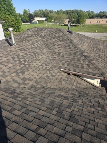 Finished shingle plane with vents and clean ridge lines by 905 Roofing Inc. in Durham Region and the GTA