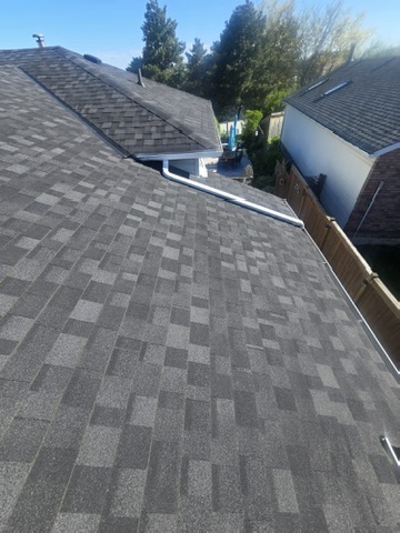 Small roof section with vents and clean shingle finish by 905 Roofing Inc. in Durham Region and the GTA
