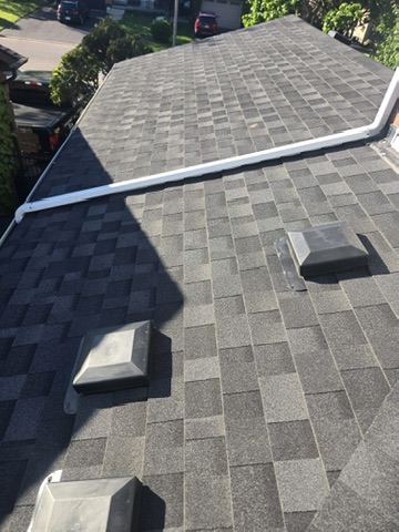 Completed roof replacement on brick residential home by 905 Roofing Inc. in Durham Region and the GTA