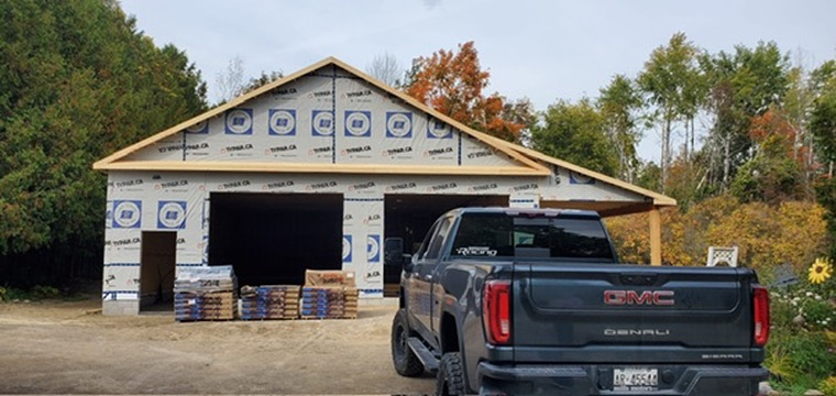 Garage roof project with materials staged onsite by 905 Roofing Inc. in Durham Region and the GTA
