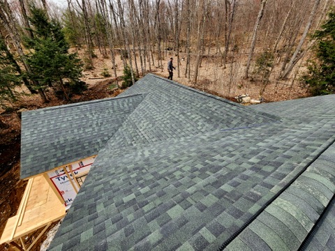 Wide view of completed cottage roof with dimensional shingles by 905 Roofing Inc. in Durham Region and the GTA