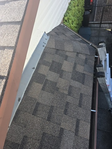 Crew installing shingles on a hot sunny day by 905 Roofing Inc. in Durham Region and the GTA