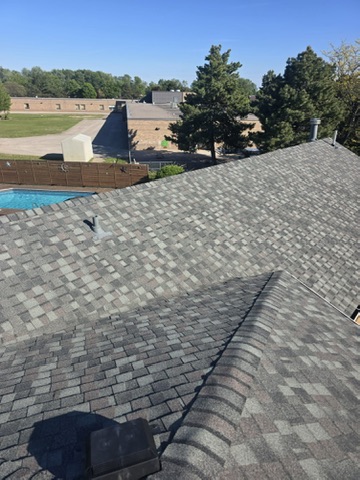 Symmetrical finished roof with ridge and hip detail by 905 Roofing Inc. in Durham Region and the GTA