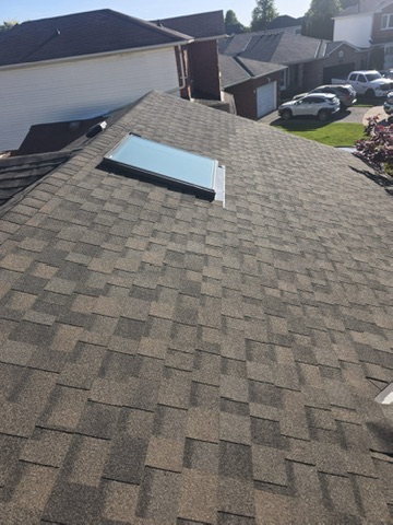 Valley transition between new and existing shingles by 905 Roofing Inc. in Durham Region and the GTA