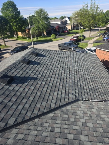 Close-up of skylight installed into shingle roof by 905 Roofing Inc. in Durham Region and the GTA
