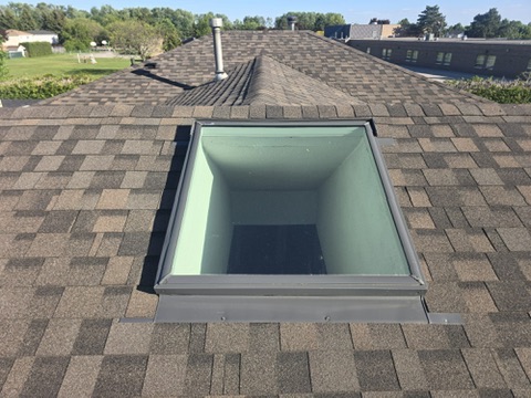 Finished roof with skylight installation by 905 Roofing Inc. in Durham Region and the GTA