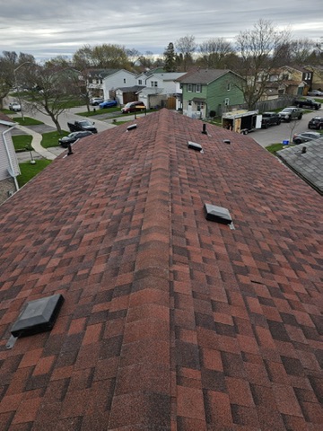 Neighbouring rooftops after multi-section roof work by 905 Roofing Inc. in Durham Region and the GTA