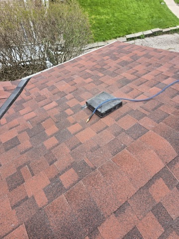 Front view of home before roof replacement completion by 905 Roofing Inc. in Durham Region and the GTA