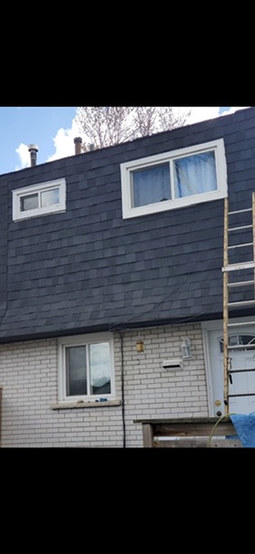 Completed dark shingle installation on residential home by 905 Roofing Inc. in Durham Region and the GTA