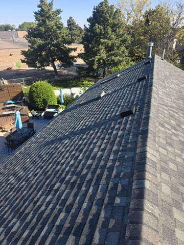Completed roof looking across residential street by 905 Roofing Inc. in Durham Region and the GTA